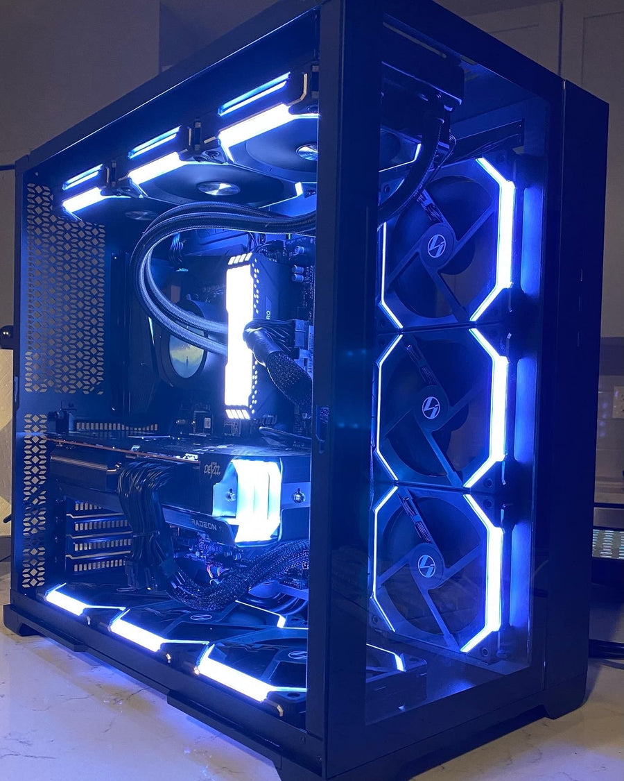 Custom gaming PC build with blue RGB lighting and liquid cooling