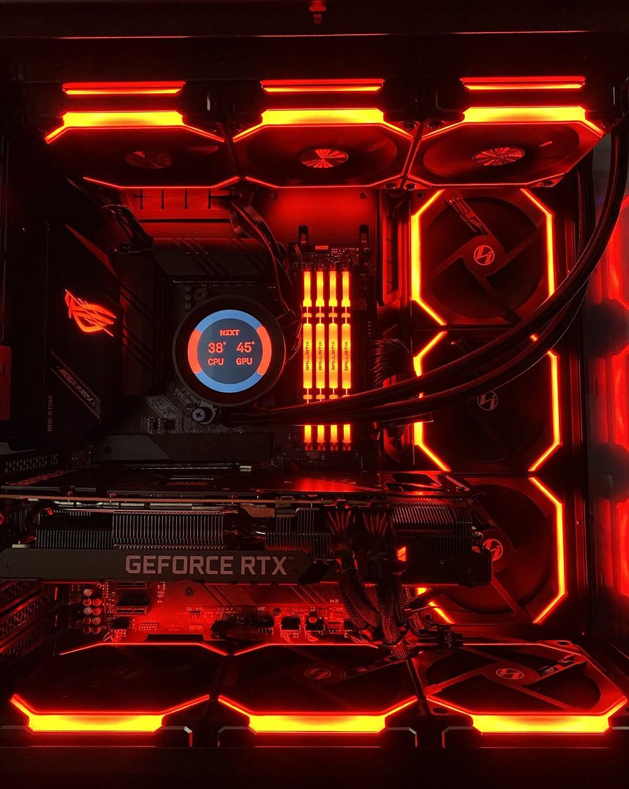 Close-up of a custom PC build with red lighting and liquid cooler