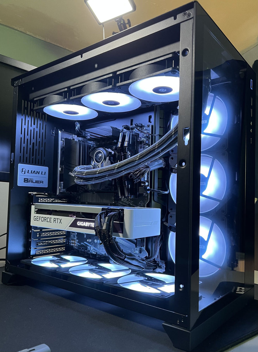 Custom gaming PC build with cool white lighting in a dual-chamber case